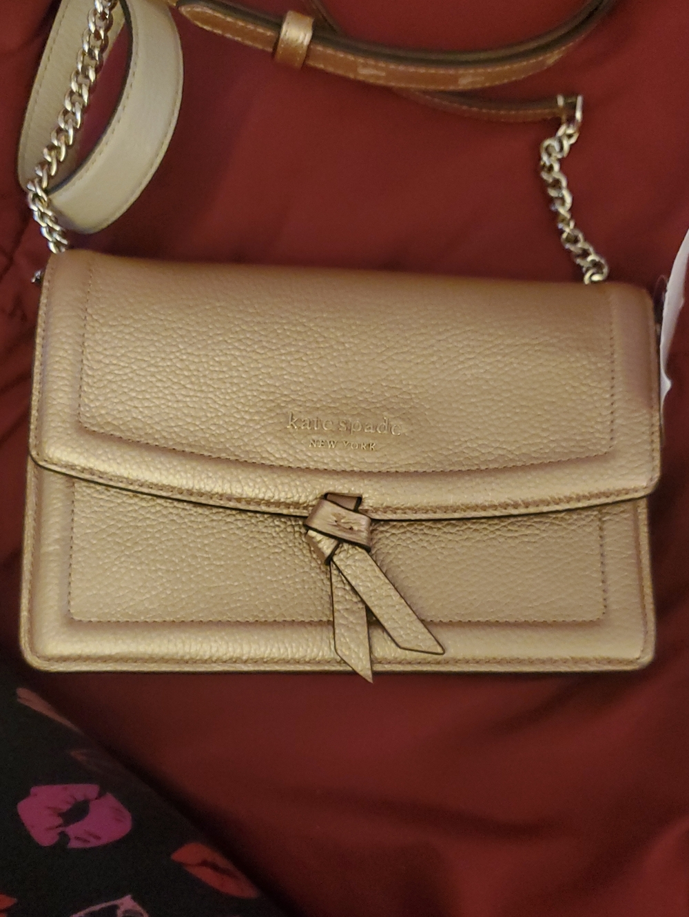 kate spade metallic gold pebbled leather crossbody with knot detail